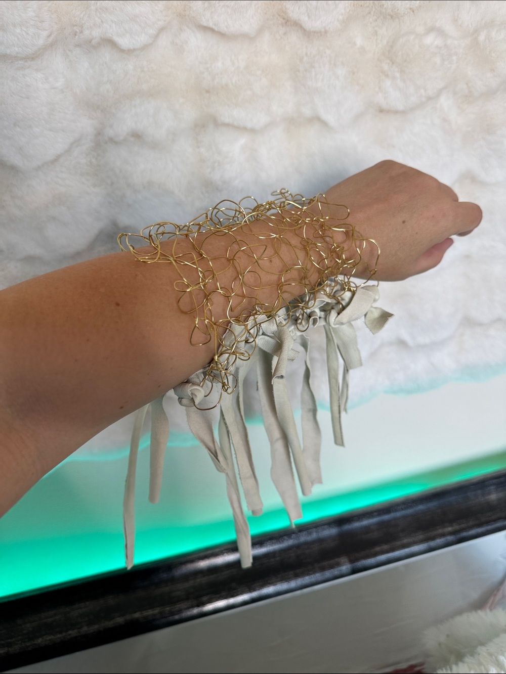 Gold toned brass Wire Fringe Bracelet with Cream leather Tassel Accents